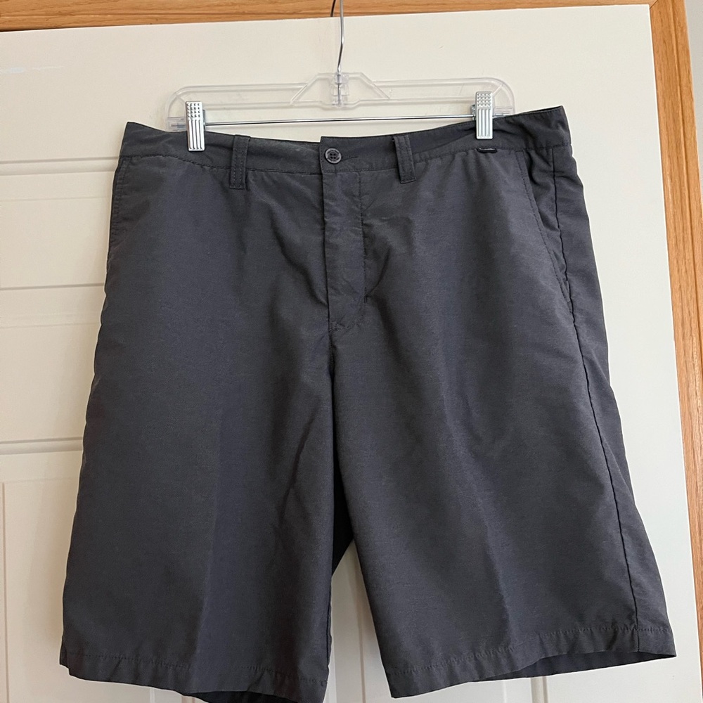 Men’s Travis Mathew gray proceed with caution performance golf shorts. 36